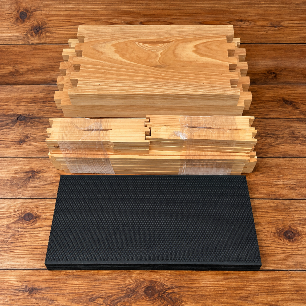 Unassembled 10-frame deep cypress beehive super kit with wooden frames and black wax-coated plastic foundation