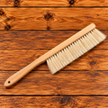 Bee brush for gently removing honey bees from frames
