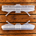 Clear plastic Beetle Jail traps for small hive beetle control in honey bee hives