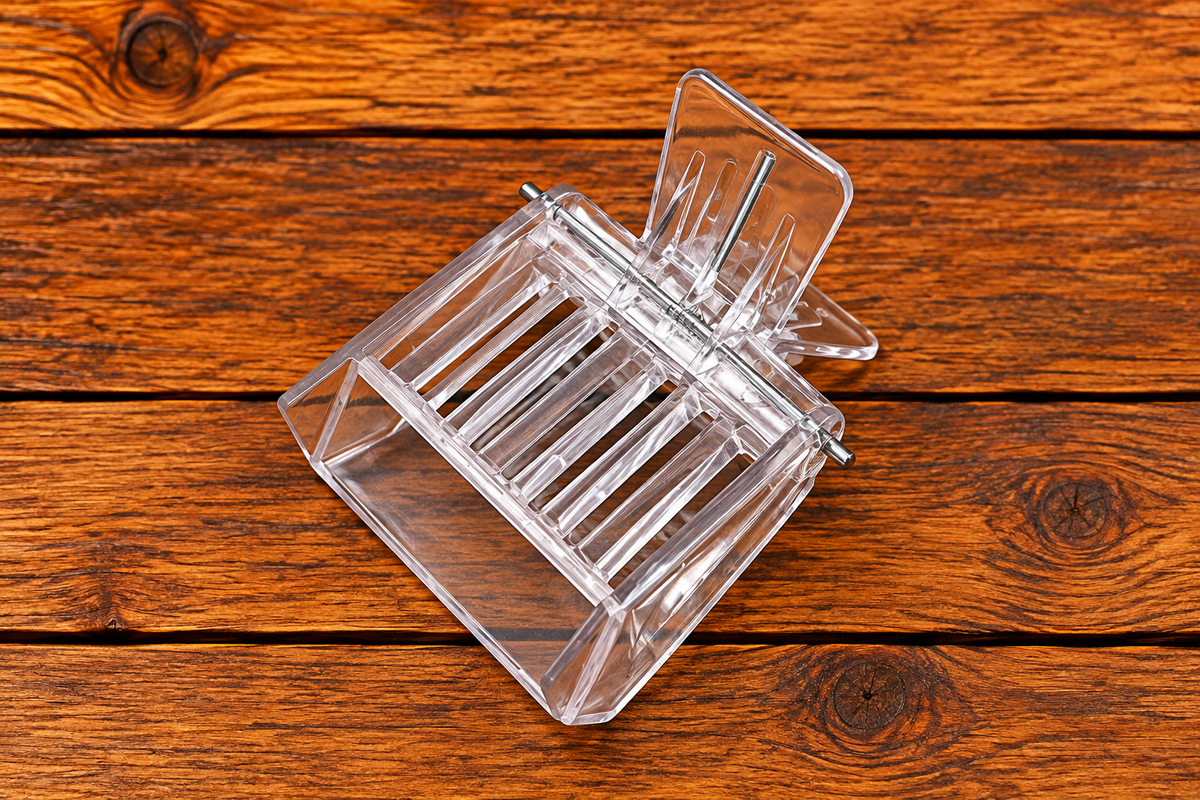 Plastic queen catcher clip for safely handling queen bees
